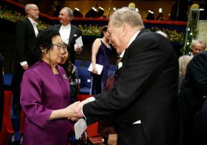 Tu Youyou, left, the 2015 Nobel laureate in Physiology or Medicine, is being congratulated following the Nobel Prize award ceremony at the Concert Hall in Stockholm, Sweden on December 10 