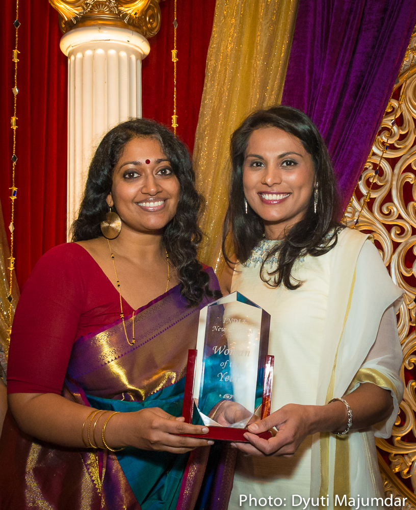 Dr. Nahid Bhadelia, Woman of the Year 2016, giving trophy to Annette Philip, Woman of the Year 2016.