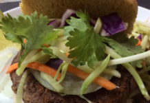 Spicy, black bean burger with cilantro and a light, yogurt sauce