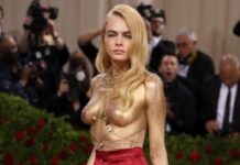 Cara Delevingne strips off to show gold-painted body on Met Gala red carpet