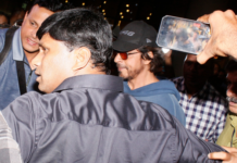 SRK seen in Mumbai airport after reports of accident in US