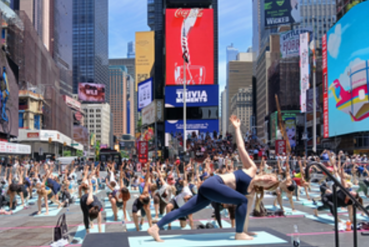 Yogis create island of stillness at New York's frenetic Times Square ...
