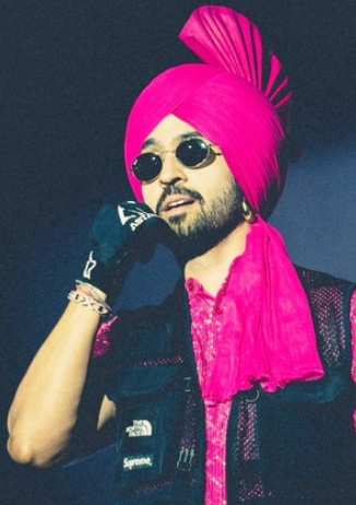 Diljit Dosanjh notices fans watching Ahmedabad show from hotel balcony without tickets, pauses show