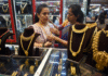 Gold Prices Fall as Safe-Haven Demand Eases and Fed Cut Expectations Cool